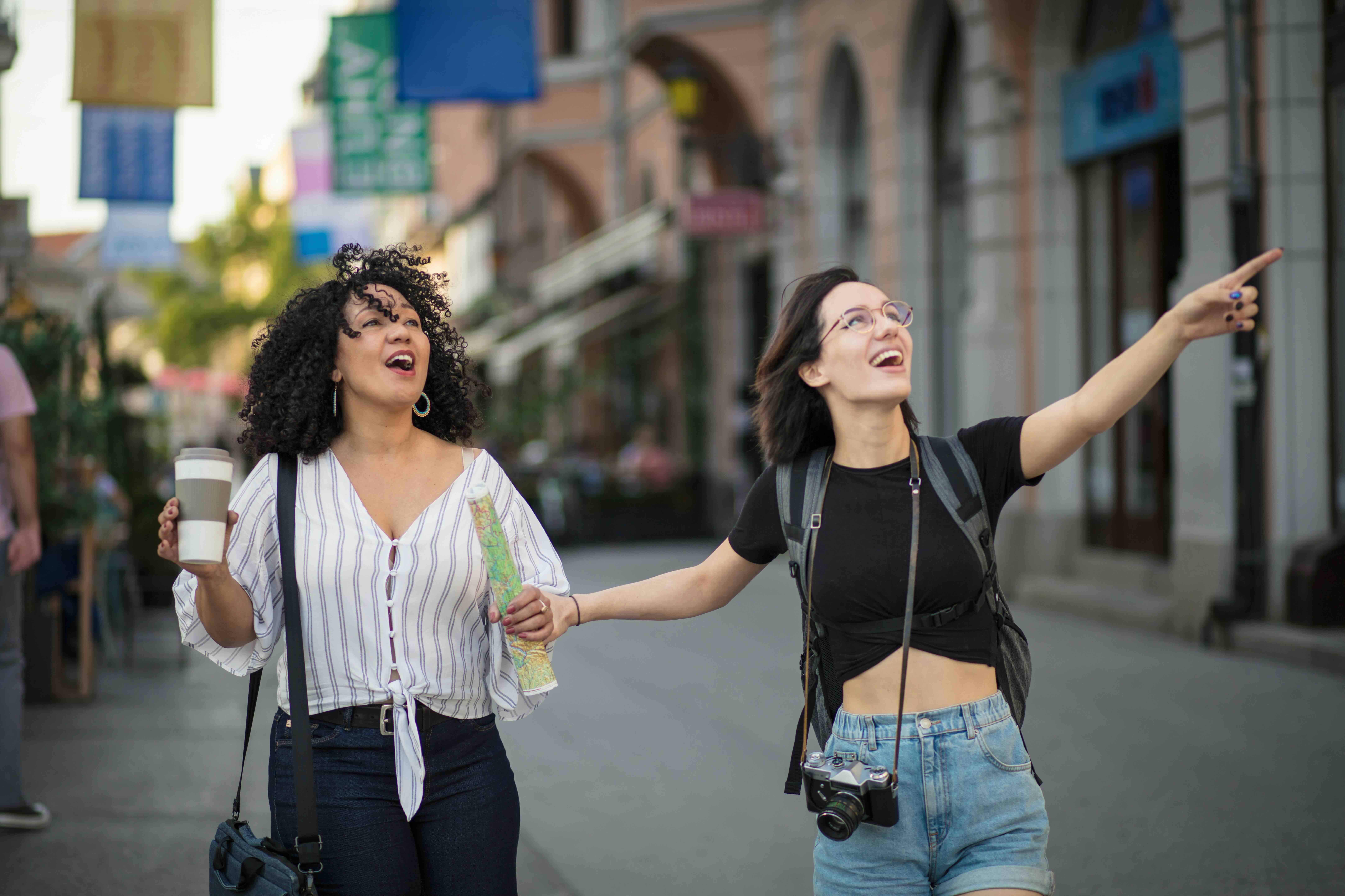 Young coworkers, representing the next generation of accountants, exploring a new city
